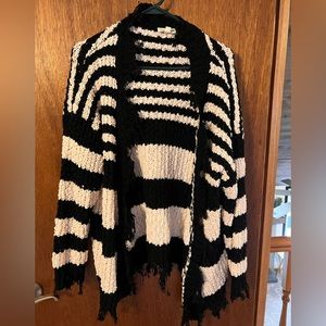 Distressed black and white open cardigan